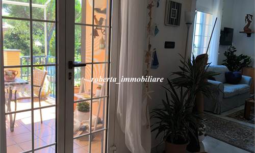 Appartamento con giardino e garage